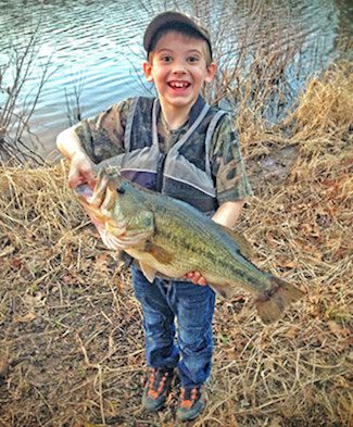 Young Boy Catches Giant Bass on Free Toyota Promo Lure by: admin
