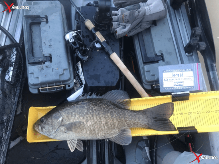 Chris Poe Takes the early morning lead @ the Bass Cast Kayak event on SML with 18.25”